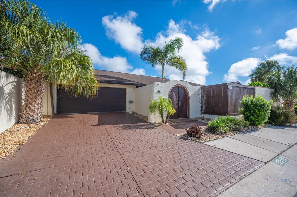 Photo of 13510 Avista Drive, Tampa, FL 33624 (MLS # TB8547705)