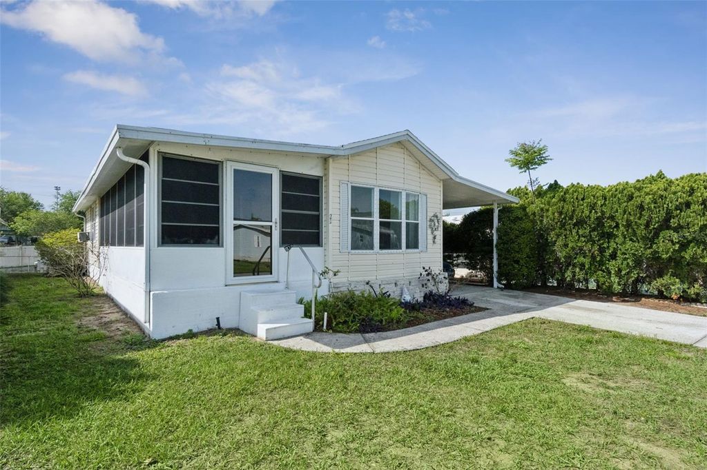 Photo of 50989 Highway 27 #21, Davenport, FL 33897 (MLS # O6397448)