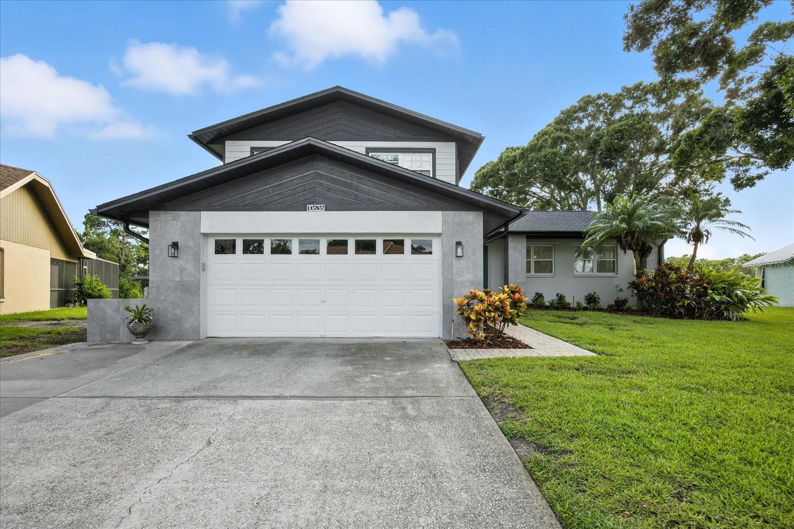 Experience the epitome of Florida waterfront living with this exceptional, fully remodeled multi-split home, perfectly positioned on 120 feet of private shoreline along Lake Seminole. Nestled on a serene, southwest-facing lot, this 4-bedroom, 3-bathroom residence captures panoramic lake views, breathtaking sunsets, and the beauty of nature with visits from ospreys, bald eagles, and herons right from your backyard—no flood insurance required (X500 zone).
Step inside to discover a thoughtfully designed interior with vaulted ceilings where elevated craftsmanship and timeless finishes set the tone. The heart of the home is the expansive chef’s kitchen, featuring custom cabinetry, high-end JennAir appliances, an oversized island with glass-front cabinets, and abundant space for entertaining. Whether you're hosting holiday gatherings or casual lake days, this space is made to impress.
The main living area boasts open-concept design with tile flooring, plantation shutters, luxury roller shades, and sophisticated built-ins throughout. Downstairs, a cozy family room with gas fireplace and custom penny tile surround offers a welcoming retreat, along with a full guest suite, full bath, laundry room, and access to the spacious 2-car garage with storage.
Upstairs, the private primary suite is a sanctuary with sweeping lake and wooded views, luxury vinyl flooring, custom built-ins, and a spa-inspired ensuite bath. There’s even potential to build a private deck off the suite—ideal for sunrise coffee or evening stargazing. Two additional guest bedrooms and a full bath complete the upper level.
Outside, resort-style amenities await. The kidney-shaped pool is both screen-enclosed and partially covered, allowing for cool, shaded afternoon swims with unobstructed lake views. A private dock with a 10,000 lb boat lift—currently home to two jet skis—lets you launch straight into Lake Seminole’s 685 acres of recreational paradise, perfect for boating, tubing, skiing, and world-class bass fishing.
Home features 2024 Shingle Roof, a newer tankless water heater, whole-home water softener system, and 2025 Interior and Exterior paint. The home is cooled by two separate HVAC systems. The front façade is finished with sleek modern gray tile accents, enhancing curb appeal and complementing the home’s elevated design.
This is more than a home—it’s a lifestyle. Private, peaceful, and beautifully appointed, this lakeside retreat offers the best of Florida living with none of the compromises. Welcome to life on Lake Seminole.