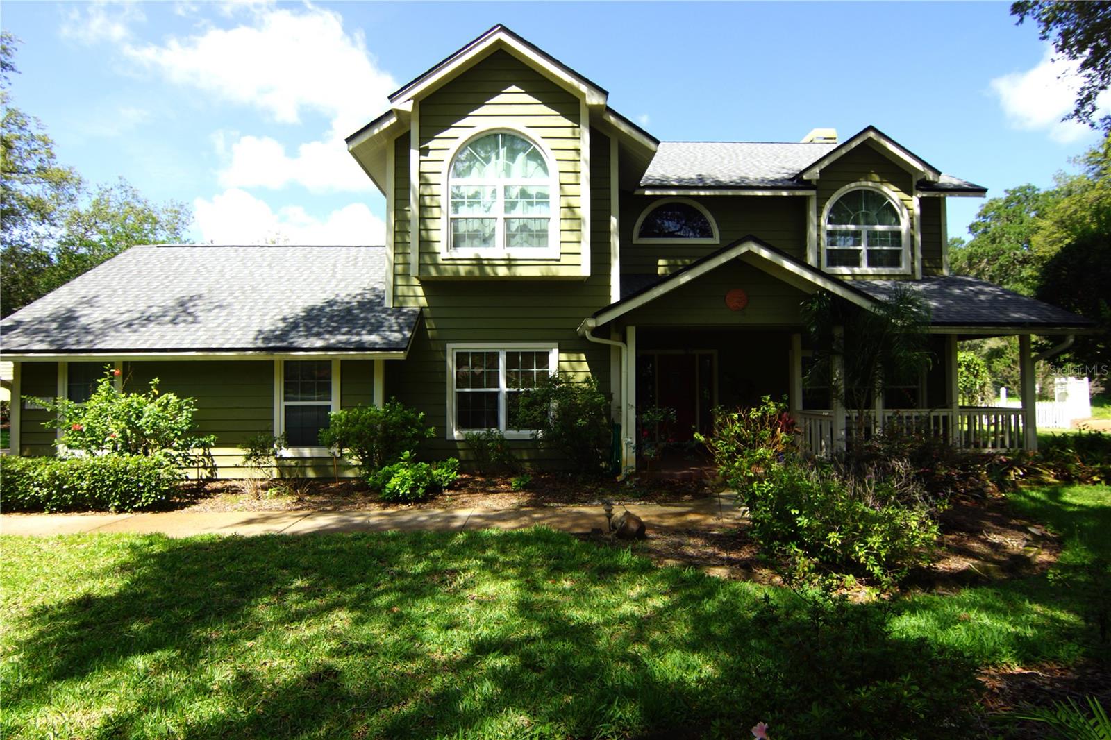 Incredible opportunity to own this traditional 2-story, salt water pool home on an over 1/2-acre lot, on 2 cul-de-sacs in the highly sought after community of Hammock Woods. Located in the Steinbrenner School District, this home has a brand-new roof, and two newer A/C units (2022). A seller's home inspection as already been proactively completed, and any suggested repairs have already been addressed. You are going to fall in love with this with this quiet location nestled between a giant oak canopy and mature landscaping with a private back yard. The large open foyer features a winding grand staircase with oak wood floors throughout most of the downstairs. The Family Room boasts a wood burning fireplace. The Dining Room has French Doors with a Bay window. The Kitchen features a large island with cooktop, with an eat-in-area next to the bay window which overlooks the pool area and backyard. There is one bedroom downstairs which is currently being used as a craft room. The Master Suite is located upstairs and features a large Master Bath with a garden tub and split sinks. There is also a 2nd story balcony if you just need some quiet time to relax. The screened in pool area is complete with a self-cleaning saltwater pool with a pavered patio. Don't be the one to miss out - Hurry!