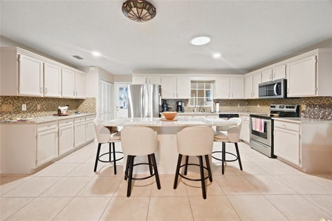 Tiny photo for 9871 SW 87th Terrace Road #D, Ocala, FL 34481 (MLS # OM734502)