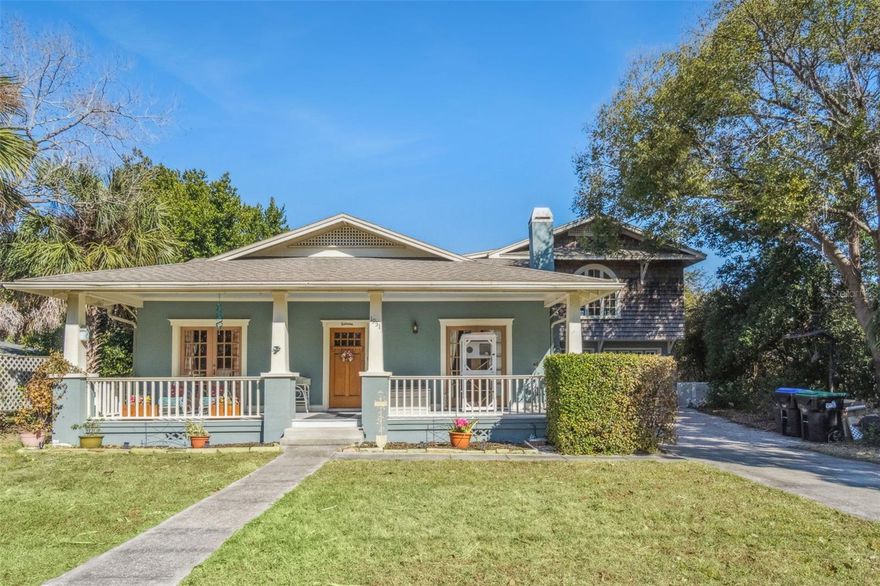 Welcome home to the charm and character of the bygone days. This 3-bedroom, 2-bathroom home offers 2,556 square feet, with the historic main home originally built in 1922. Featuring original antique wood floors, a classic fireplace, and a one of a kind upstairs loft, there's nothing quite like it! A charming front porch welcomes you into the living room with a fireplace. A front room currently used as a formal parlor or sitting room doubles as the third bedroom, also ideal for entertaining or reading. Two additional bedrooms and full baths are located down the hall. The dining room sits just off the main living space, with French doors opening into the hallway. The kitchen is positioned toward the back of the home with a tucked away laundry closet. Accessed by an interior staircase off the kitchen, the HIGHLIGHT of the home is the handcrafted upstairs loft with design in a class of itself. Currently used as an exquisite billiards room and library, this flexible space can serve as a library, office, or creative retreat, and features a balcony with views of Lake Killarney. Additional features include 42-inch kitchen cabinets, stone countertops, a roof replaced in 2018, AC replaced in 2019. Wind mitigation passed April 2024, septic pumped October 2025, and on top of it all, no HOA! Conveniently located minutes from Downtown Winter Park, Park Avenue, Rollins College, and just minutes from I-4, this is a truly unique property offering craftsmanship and character rarely found today.