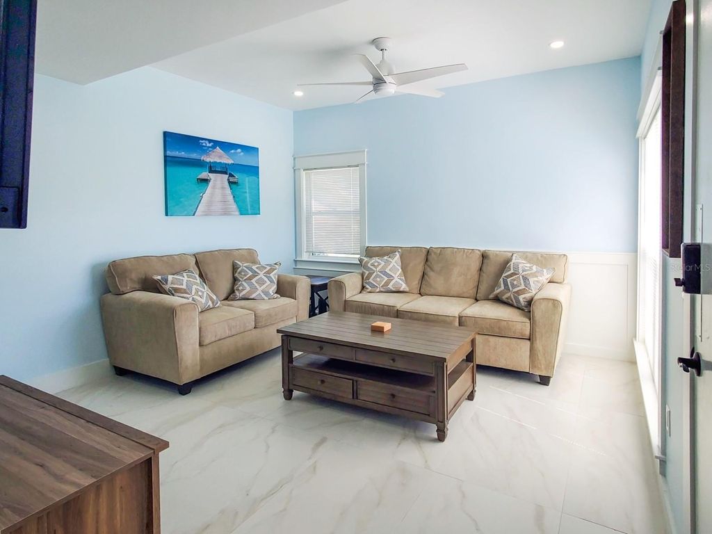 Photo of 215 Medallion Boulevard #G, Madeira Beach, FL 33708 (MLS # O6314450)