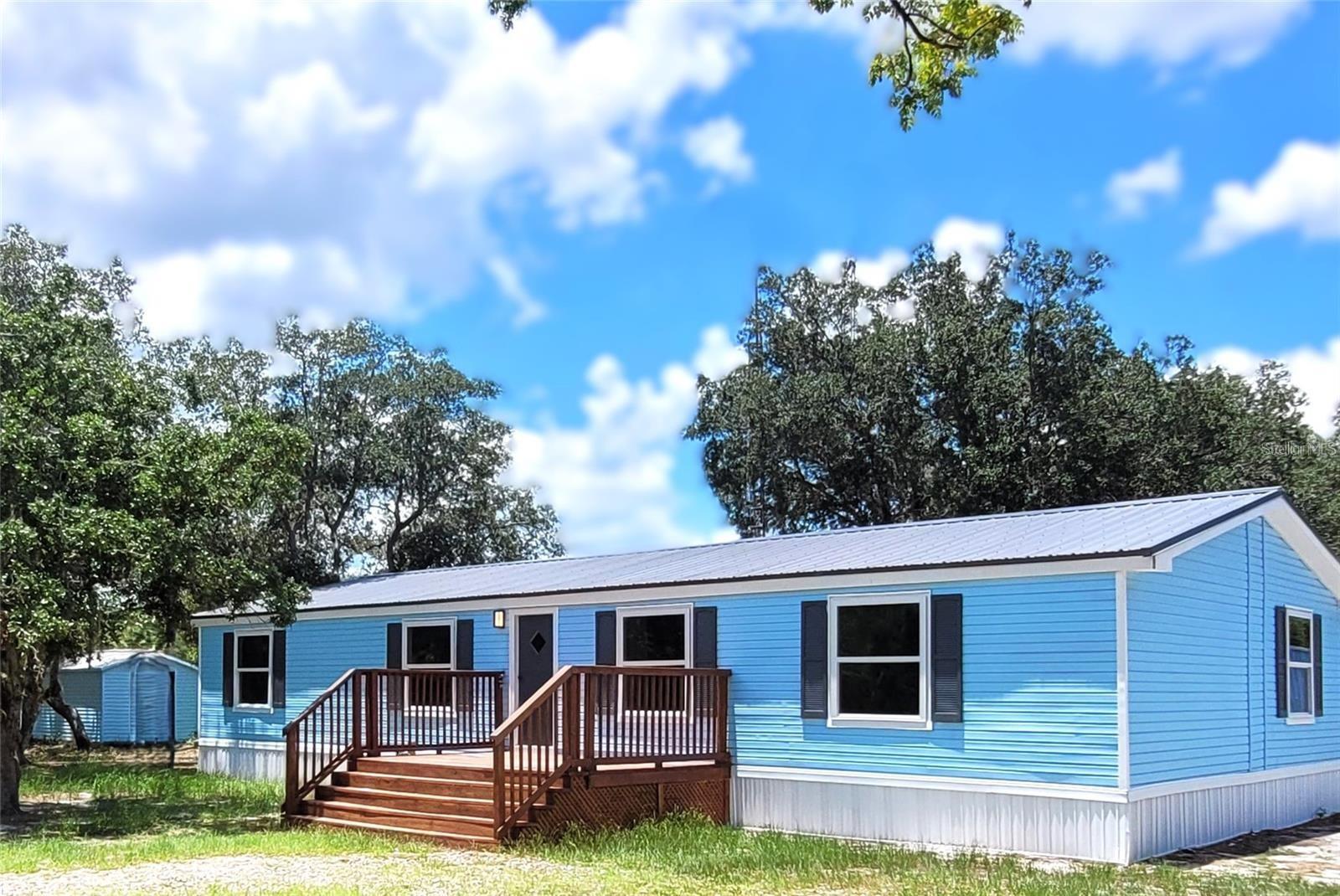 Escape to the tranquility of rural living with this well-kept 3-bedroom, 2-bath mobile home nestled on a generous parcel of land. Surrounded by open skies and natural beauty, this property offers the perfect blend of privacy, comfort, and room to grow. Bring your work vehicle, boats or side by side. This property will provide you what you need. Schedule a showing today!