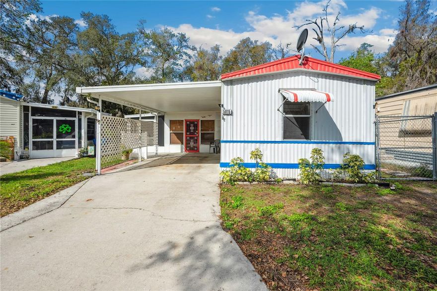 Welcome to easy living in this well-maintained 1992 single-wide manufactured home, nestled in a quiet and welcoming 55+ community that’s pet friendly! Offering 2 bedrooms and 2 full bathrooms, this home is perfect for those looking to downsize without compromising comfort.
Step inside to find an open and functional layout, featuring a spacious Florida room, a bright eat-in kitchen with plenty of wood cabinet space and open to the living room. Split bedrooms for added privacy. Two full bathrooms both with walk-in showers.
Enjoy your morning coffee on the screened-in porch or relax in the low-maintenance yard, ideal for small pets. Additional highlights include central A/C (04), a dedicated laundry area with double doors to the screen room, a covered carport and fenced in yard with a side ramp if needed.