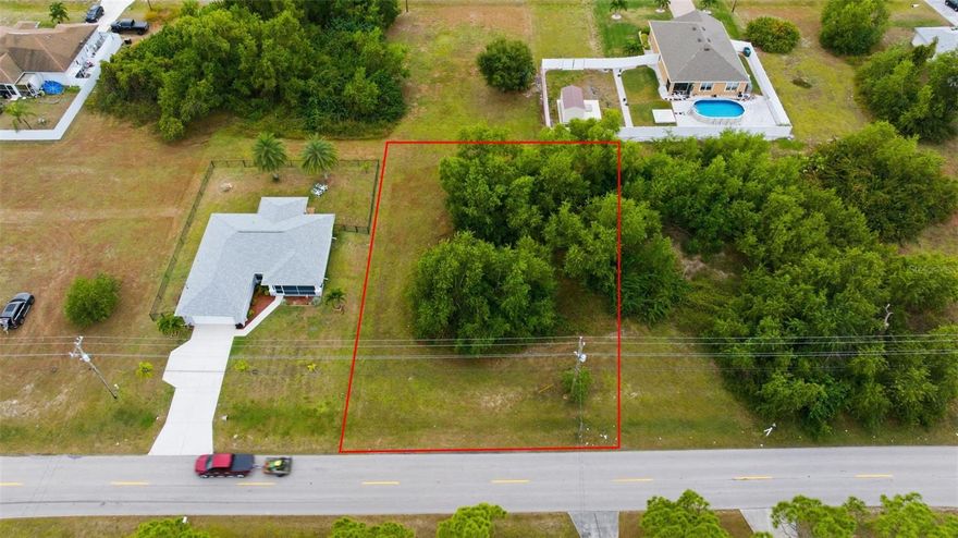 Build Your Dream Home in Sunny Cape Coral! Don’t miss this fantastic opportunity to own a 10,019 sq ft / 0.23-acre residential lot in the growing and highly desirable Northeast Cape Coral area! This cleared lot (outlined in red in photos for reference) is nestled in a quiet, well-maintained neighborhood with newer homes nearby, providing a perfect blend of privacy and community charm. With paved road access, power nearby, and no HOA, this property is ideal for your future home or investment project. Just minutes from schools, shopping, dining, parks, and entertainment, with easy access to US-41 and I-75. Enjoy the Florida lifestyle with plenty of space for a pool or custom outdoor oasis! Whether you're a builder, investor, or planning your forever home, this lot checks all the boxes. Secure your slice of Southwest Florida today!