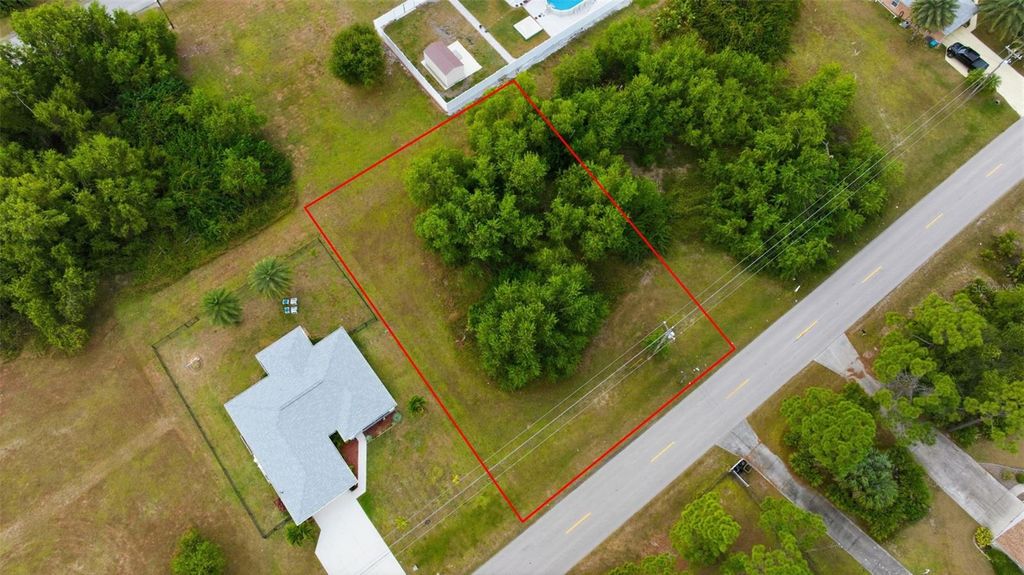 Photo of 618 Jacaranda Parkway E, Cape Coral, FL 33909 (MLS # TB8455374)