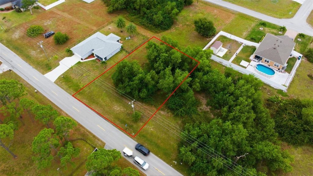 Photo of 618 Jacaranda Parkway E, Cape Coral, FL 33909 (MLS # TB8455374)