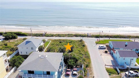 Photo of 6498 S Atlantic Avenue, New Smyrna Beach, FL 32169 (MLS # NS1089465)