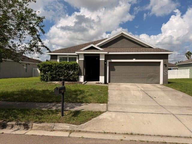 Photo of 633 Highland Meadows Avenue, Davenport, FL 33837 (MLS # S5159741)