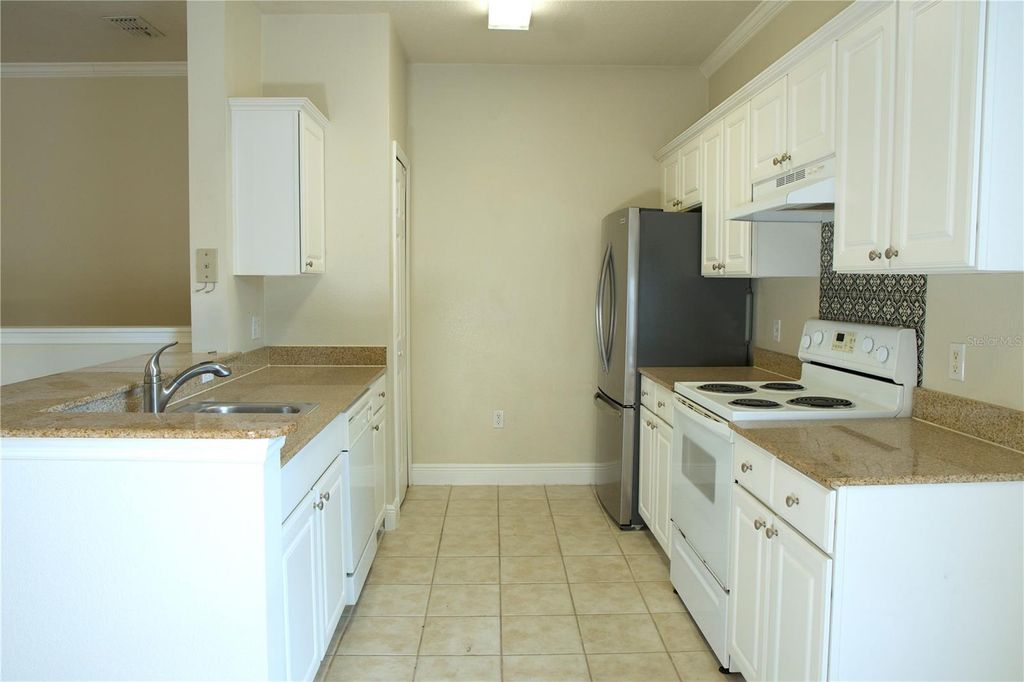 Photo of 233 Southern Pecan Circle #101, Winter Garden, FL 34787 (MLS # S5144851)