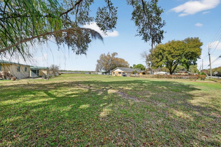 Lakefront homesite with 70 FEET OF LAKEFRONTAGE on BEAUTIFUL Lake Bonny— Homesite is HIGH & DRY — cleared, build-ready, and ideal for a custom lakefront home or private waterfront retreat in Lakeland. *** This 0.64-ACRE residential lakefront lot offers a RARE OPPORTUNITY to build your dream home on the shores of Lake Bonny, one of Lakeland’s scenic freshwater lakes known for fishing, boating, and sunset views. NO HOA - With approximately 70 feet of direct lake frontage, the property provides space and flexibility to design a custom lake house, waterfront residence, or private estate homesite with beautiful water views. *** The parcel is zoned R-2 residential and ALREADY HAS UTILITIES IN PLACE: public water, electricity, and septic in place, making it easier to start building your custom home or lakefront retreat. CLEARED LOT ready for construction. BRING YOUR BUILDER, architect, and plans to create the lakefront lifestyle you’ve been envisioning. ***
For buyers searching for BUILDABLE WATERFRONT lakefront homesite - residential land with water access, or custom home lots, this property offers a strong foundation for a primary residence, second home, or peaceful waterfront getaway. *** Outdoor enthusiasts will appreciate the NEARBY PUBLIC BOAT RAMP for Lake Bonny , making it easy to launch a boat, kayak, or paddleboard. Anglers will love the fishing opportunities on Lake Bonny, while the skate park across the lake and nearby parks add recreation and community amenities. ***
Located in a no-HOA neighborhood, this homesite offers freedom and flexibility while still being just a short drive to Lakeland restaurants, shopping, and entertainment. Whether you envision a modern lake house, traditional waterfront home, or custom lakefront retreat, this property provides the space and location to bring your vision to life. *** Walk the property today and imagine your future lakefront home overlooking Lake Bonny’s beautiful sunsets.