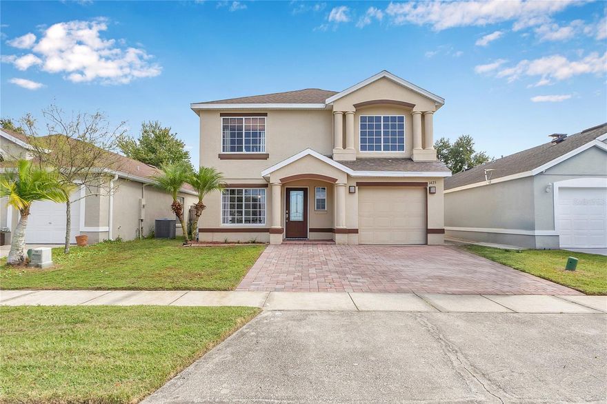 Welcome to this beautifully updated and versatile home in the highly sought-after Southchase community of Orlando!

This spacious 4-bedroom, 2.5-bath residence offers a bright, open layout filled with natural light. The living room, dining area, and kitchen flow seamlessly together—creating an inviting space perfect for everyday living, family gatherings, and entertaining.

Enjoy the beautifully renovated bathrooms and new flooring throughout, along with kitchen upgrades that include stylish cabinet backsplash and a decorative panel accent wall in the dining area. The garage has been enclosed and remodeled with sleek tile flooring, offering extra living or workspace flexibility.

Outside, you’ll find even more to love—new pavers installed on the driveway and half of the backyard, plus an extended concrete patio that’s perfect for outdoor dining and relaxing under the Florida sunshine.

Situated at the intersection of two streets, this home has no front or rear-facing neighbors, offering an open view, enhanced privacy, and abundant natural light. Ideal for families, remote professionals, or investors seeking great income potential.

Located in a quiet, well-established neighborhood just minutes from Orlando International Airport, The Loop Shopping Center, Medical City/Lake Nona, Major highways (417 & 528),Dining, parks, and top-rated schools. Don’t miss your chance to call this Southchase gem home!