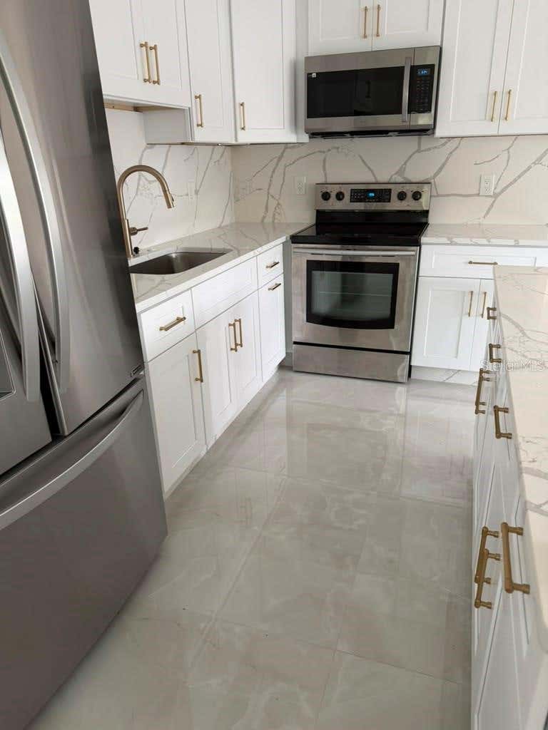 Photo of 755 N 75th Avenue N #1, St Petersburg, FL 33702 (MLS # TB8531215)
