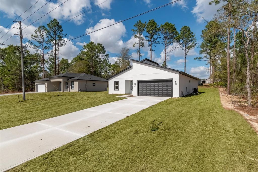 Photo of 1609 W Citrus Springs Boulevard, Citrus Springs, FL 34434 (MLS # S5144599)