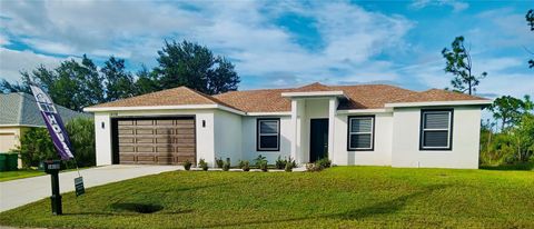 Photo of 14108 Chesswood Lane, Port Charlotte, FL 33981 (MLS # O6341943)