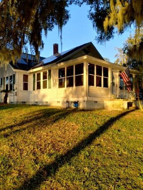Photo of 305 Lakeside Avenue, Umatilla, FL 32784 (MLS # TB8441438)