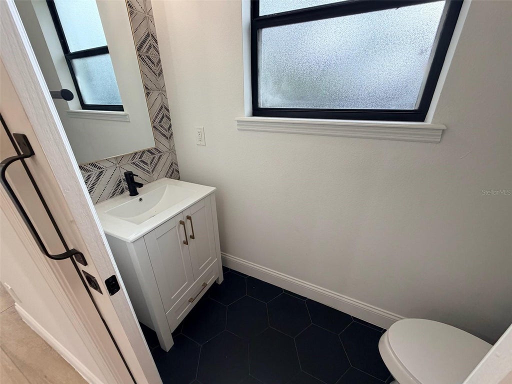 Photo of 2013 E Esther Street, Orlando, FL 32806 (MLS # O6437752)