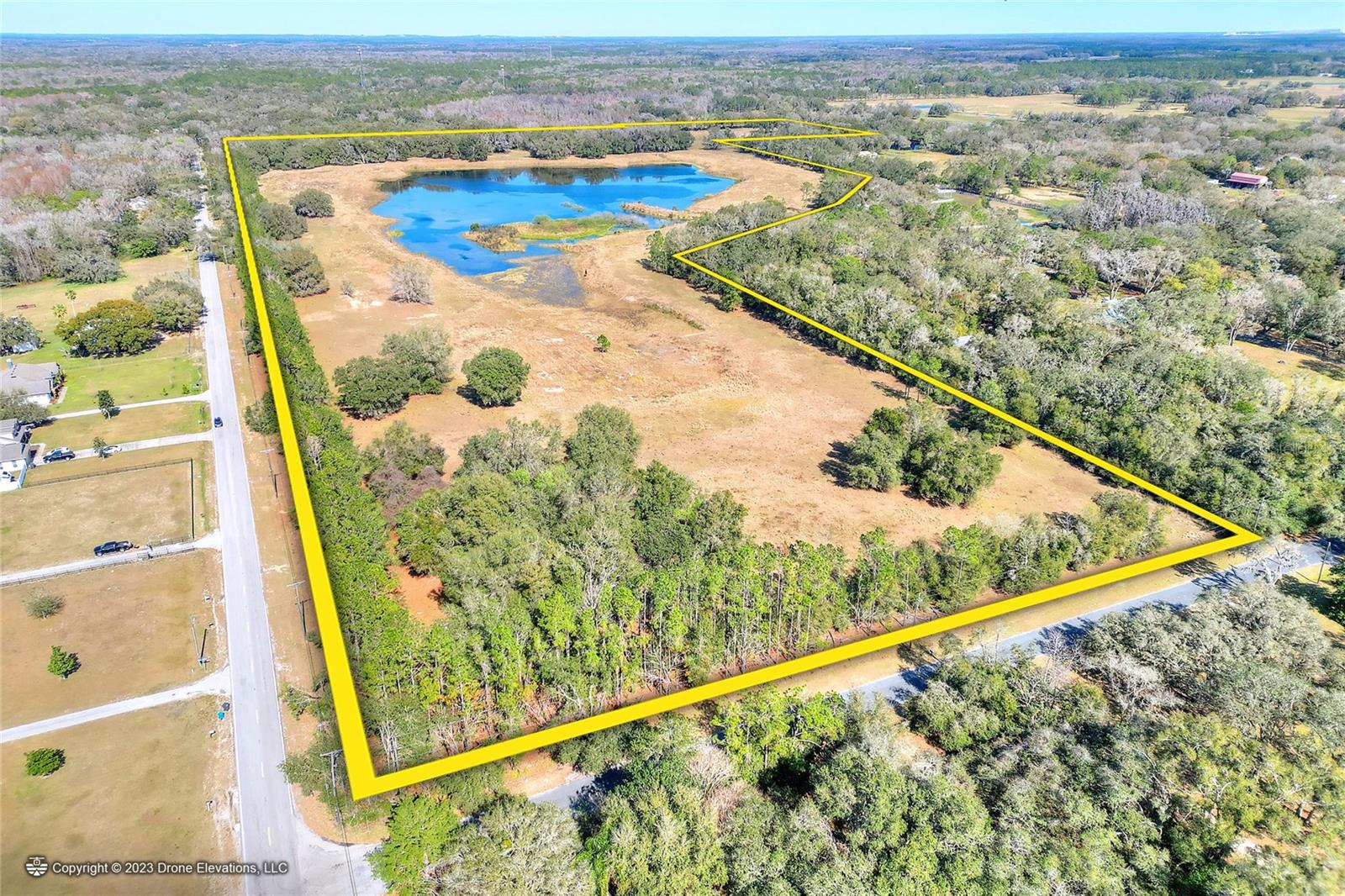 Spectacular 68+ acres featuring a serene 16-acre pond in the center, surrounded by lush upland pasture, and oak hammocks. Perimeter fenced and lined with trees providing an effective and natural privacy buffer. The southern 20 acres of this property is zoned ASC-1 (1 home per acre) and the northern 48 acres is zoned AS-0.4 (1 home per 2.5 acres), with over 2,600 feet of frontage on McIntosh Road and 564 feet on Ike Smith Road, this property has significant potential. Under a mile to the Old Fort King Trail which provides as an entry point, into the 16,000-acre Lower Hillsborough Wilderness Preserve with more than 60 miles of trails. Less than a minute to Highway 301, providing easy access to I-75 and I-4 and just 30 minutes to Tampa International Airport.