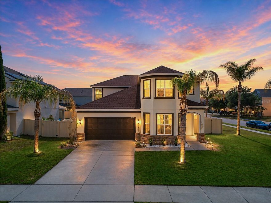 Discover modern luxury in this stunning two-story home featuring 5 spacious bedrooms and 3.5 beautifully designed bathrooms. This contemporary residence offers an open-concept layout filled with natural light, stylish finishes, and plenty of space for comfortable living and entertaining. This home is packed with valuable upgrades, including solar panels for energy efficiency and savings, a new roof installed in 2023, and a freshly painted exterior completed in 2025, giving the property outstanding curb appeal and long-term peace of mind. The home is also equipped with a 50-amp emergency circuit breaker for generator backup, helping keep your household powered during unexpected outages. The gourmet kitchen flows seamlessly into the living and dining areas, creating the perfect setting for gatherings. Featuring beautiful finishes with elegant crown molding. Step outside to your private backyard oasis complete with a fully equipped outdoor kitchen and an entirely paved backyard designed for low maintenance and year-round enjoyment. Energy-efficient solar panels provide added value and savings, while the home’s modern design and thoughtful upgrades make it truly move-in ready. With generous living spaces, elegant details, and exceptional outdoor amenities, this home perfectly blends comfort, style, and functionality.