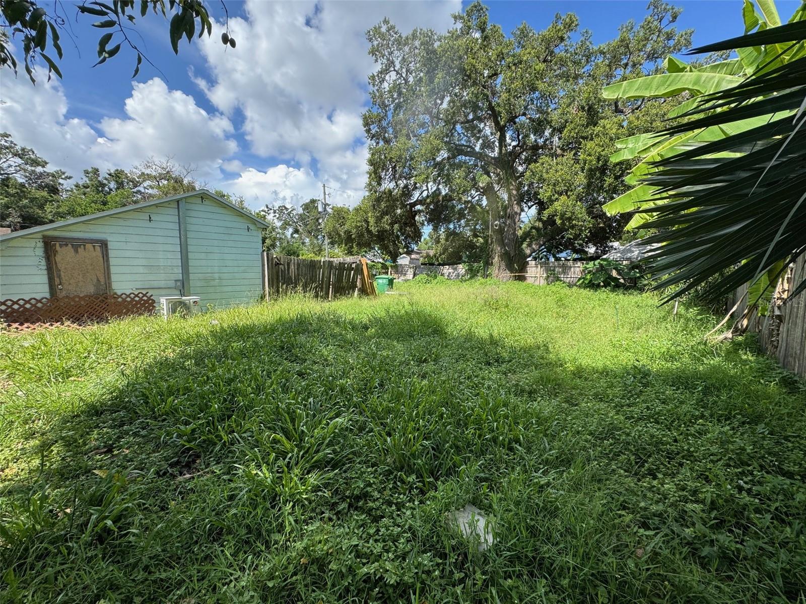 Newly divided* single-family residential building lot in a great treed neighborhood with many high-value $1M+ home values. Quiet residential street with quick access to Tampa's lively neighborhoods, downtown and the river walk. Adjacent access to city sewer and water. Many newly built high-value homes in this neighborhood. Plans for a 2-story 4 bedroom/3 full bath home available for this lot. *PD new lot division subject to City Council approval in end of August 2025. Check city zoning and building department for all details and approval information. Small building to be demolished on lot by new lot owner. New lot is located behind (West) of current home that faces East at 4202 N Seminole Ave. New lot will have an E Genesee Street address and will face South on E. Genesee. No trees need to be removed to build new house.