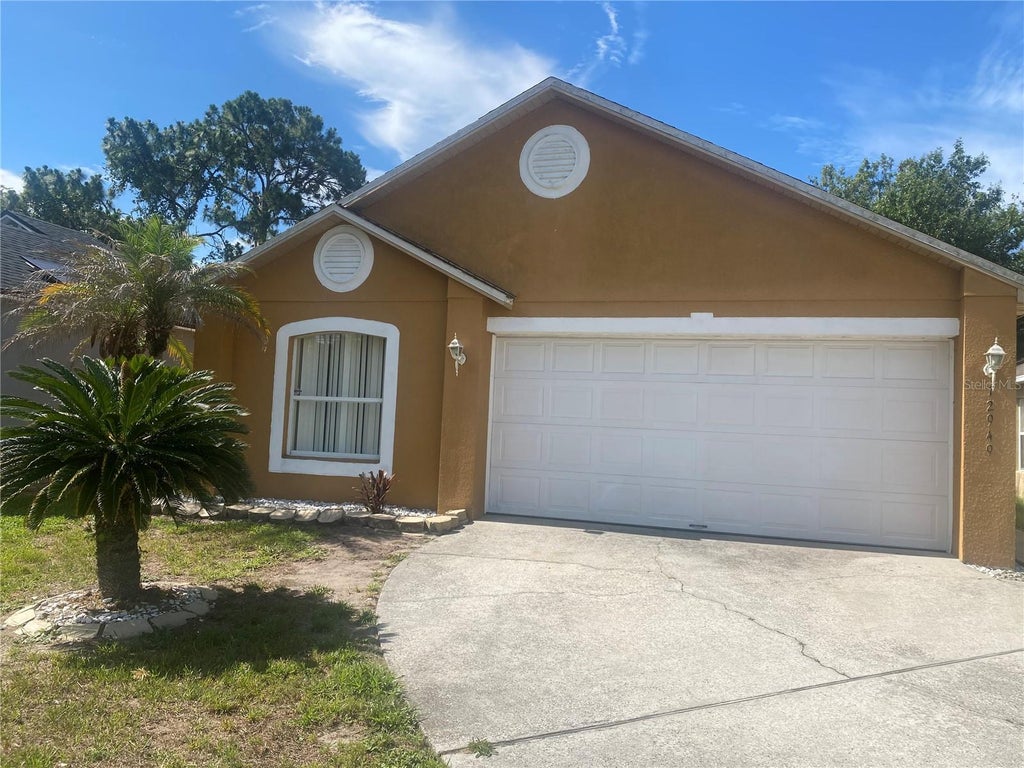 Photo of 12949 Odyssey Lake Way, Orlando, FL 32826 (MLS # O6415182)