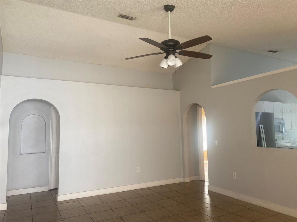 Photo of 12949 Odyssey Lake Way, Orlando, FL 32826 (MLS # O6415182)