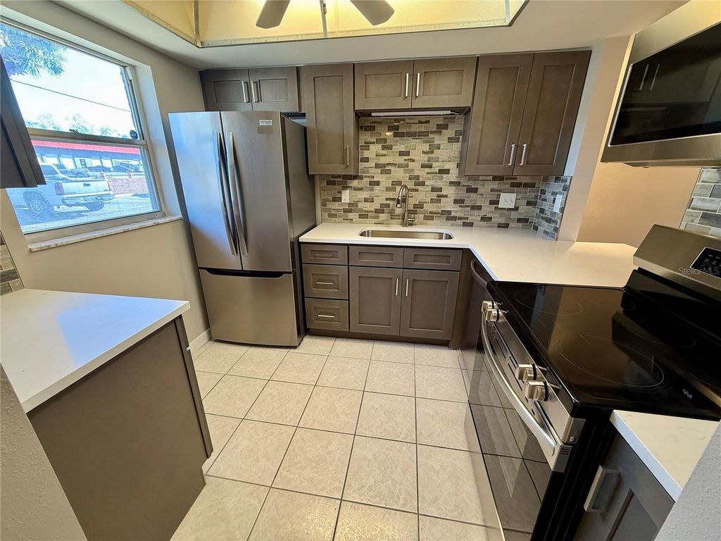 Photo of 4805 Alt 19 #111, Palm Harbor, FL 34683 (MLS # TB8473831)