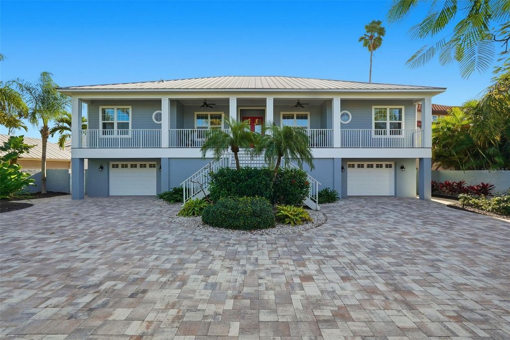Photo of 401 Harbor Drive, Belleair Beach, FL 33786 (MLS # TB8454528)