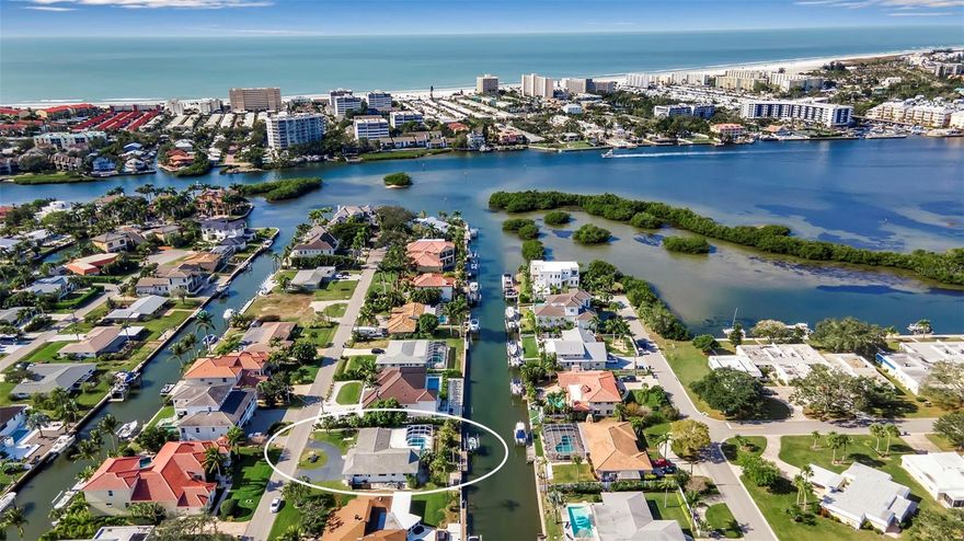 Discover the perfect blend of coastal charm and everyday convenience with this beautiful canal-front lot in Aqualane Estates, right in the heart of Sarasota. Set on over a quarter-acre of land, this property offers an incredible opportunity to move in, renovate, or build your dream waterfront home. You can relax knowing the home had no damage from Hurricanes Helene or Milton, and boating is a breeze with your own private boat lift and direct access to the canal, leading you to Sarasota Bay and the Gulf. The location truly can’t be beat. You’re just minutes from Siesta Key Village and its world-famous beaches, plus Gulf Gate shops, Publix, Costco, great restaurants, and more. It’s the perfect mix of peaceful waterfront living and easy access to everything Sarasota has to offer. Whether you’re dreaming of a relaxed getaway, a family home by the water, an investment property or a custom new build, this parcel gives you endless possibilities