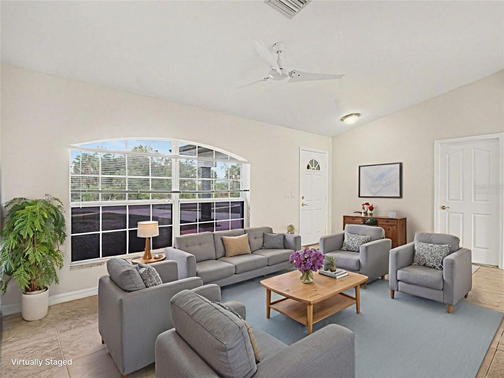 Photo of 3217 N Chamberlain Boulevard, North Port, FL 34286 (MLS # O6388778)