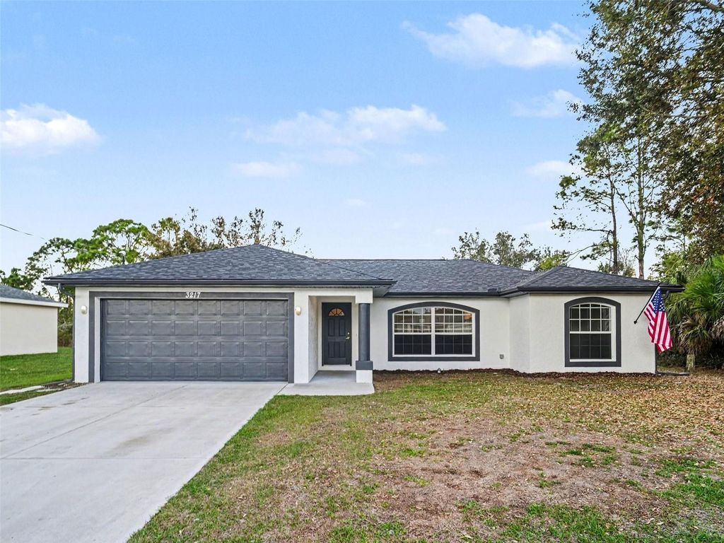 Photo of 3217 N Chamberlain Boulevard, North Port, FL 34286 (MLS # O6388778)