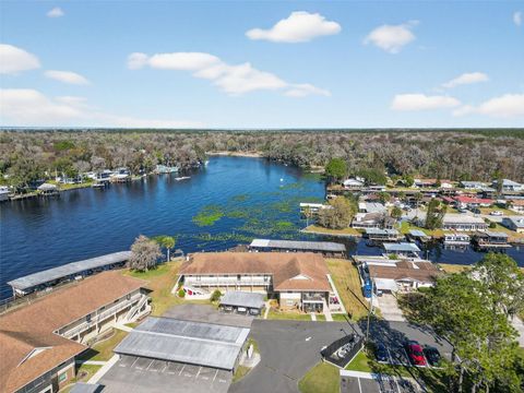 Photo of 1640 Juno Trail #102A, Astor, FL 32102 (MLS # V4946984)