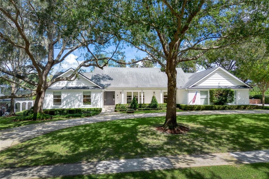 Nestled in coveted Winter Park’s Sevilla neighborhood, this 4-bed, 4.5-bath pool home delivers 3,500+ SF of refined living including 500 SF upstairs flex suite with its own full bath. A traditional foyer introduces formal living and dining rooms before the home unfolds into a spectacular 2022-renovated chef’s kitchen—an airy showpiece anchored by a 10-ft quartz island with bar seating, custom cabinetry, designer appliances, including a Thermidor side-by-side paneled refrigerator, Thermidor gas range & hood, and a Scotsman ice maker.  The main hallway leads to the re-imagined primary retreat: spa-inspired bath with double vanities, oversized walk-in shower, soaking tub, dressing table, and custom closet. Two additional guest bedrooms share a refreshed full shower bath, while a separate en-suite—ideal for in-laws or overnight guests—enjoys direct access to the pool off the kitchen hall.  Upstairs, a large bonus room with full bath adapts effortlessly to a 5th bedroom, media space, or private office. A utility-minded laundry/mud room links the interior to an oversized side-entry garage.  Out back, entertain year-round beneath a covered lanai overlooking the expansive pool and sun deck. Mature oak canopy, manicured shrubs, and full privacy fencing create a park-like sanctuary just blocks from Park Avenue dining and the back gate to Mead Botanical Garden.  Audubon K-8 and Winter Park High School District.