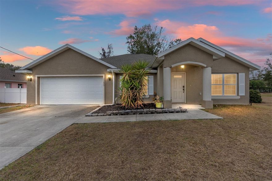 Welcome to this spacious 3BR/2BA block home with no HOA or deed restrictions conveniently located between Ocala and The Villages.  The 2-car 441 SF garage has heat/AC giving 2,375 SF of climate-controlled usable space and increasing home value for offices, workshops, gyms, or, at minimum, protecting vehicles from temperature extremes.  Interior features include both living/family rooms, large kitchen with lots of storage, tray ceilings, large primary suite with his/hers closets, large primary bath with garden tub, walk-in Roman shower, double sinks, and linen closet.  Other features include large partially fenced backyard, and water filtration and softener.  This home is perfect for the buyer who needs a lot of space.