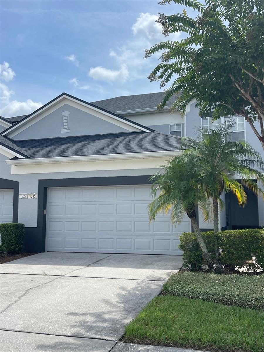 Beautiful Townhome in Spring Isle Community. This 3-bedroom, 3.5-bathroom townhome in the gated Spring Isle community offers a generous 1,822 square feet of flexible living space, highlighted by dramatic 20+ foot vaulted ceilings. Appliances, including a double-door refrigerator, range, microwave, dishwasher, and garbage disposal. Enjoy the convenience of a two-car garage and relax on the back porch. With a primary suite on both the first and second floors, each featuring a walk-in closet and a large bathroom, this home offers unique versatility to suit your needs. Natural light floods the home through three high windows near the peak of the vaulted ceiling. Located in a vibrant community with A-rated schools, you'll have easy access to nearby grocery stores, diverse dining options, and various retail and service centers. Residents can also enjoy community amenities, including a pool, playground, and recreation area. Call now to schedule a showing
