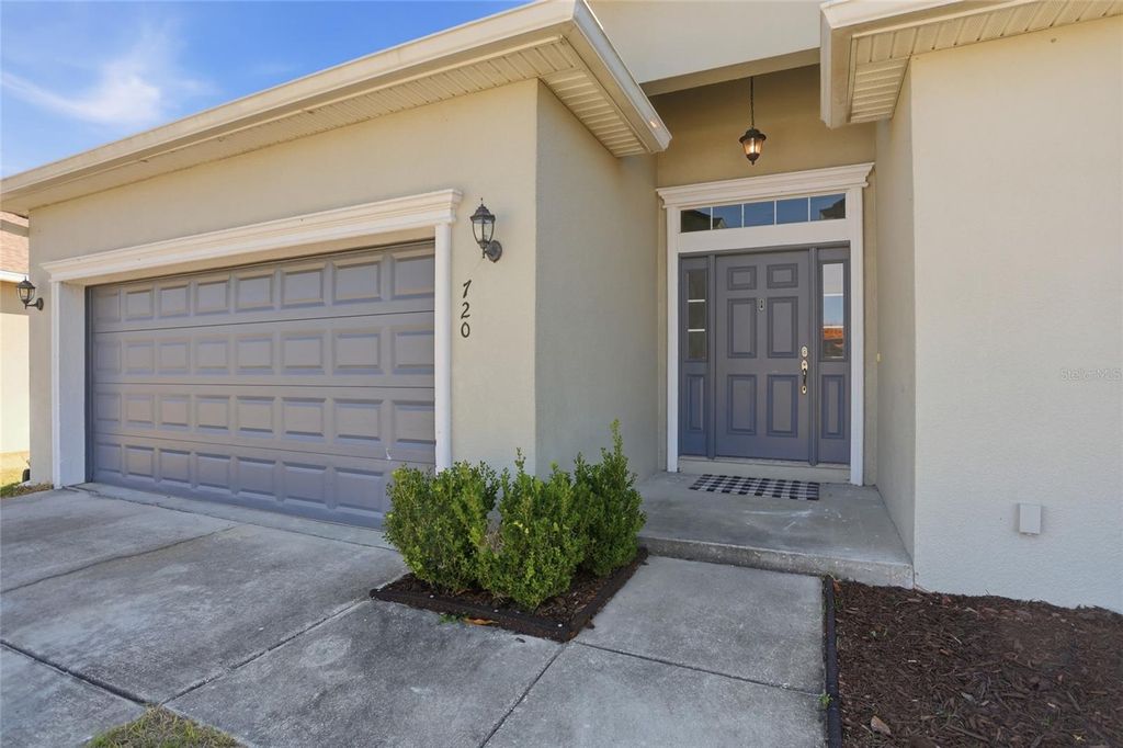 Photo of 720 Overlook Grove Dr, Winter Haven, FL 33884 (MLS # O6386447)