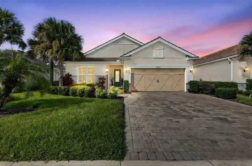 Introducing one special home in the sought after Mallory Park. Known for its amenities, central location, Position with top schools and well-built homes within a true meaning of community. A fantastic three-bedroom, two-bathroom single story home with custom blinds and plantation shutters. Superb curb appeal with the stone trim front and tile driveway. The home has wood like plank tile through the main living areas, open floor plan with a glorious kitchen with gas stove, tile backsplash, granite counter tops and a large island with a farm sink. Kinetico whole house water filtration system, water softener and reverse osmosis along with a full house generator. The office/flex room has double doored entry, tile plank flooring and built in cabinets and counter offering storage and display. The two wonderful bedrooms are carpeted and full bathroom with tile from tub to ceiling. The master bedroom is spacious, has a tray ceiling, double sink bathroom and long counter, walk-in shower tile floor to ceiling and a walk-in closet. Entering the lanai from the dining room in a corner slider which pockets on one side. The utility/laundry room has additional cabinets and sink with counter   The paver lanai has a solid covered area with built-in outdoor kitchen with long counters, grill, sink and refrigerator. The pool and spa are heated and have a salt cell. Electronic hurricane lanai screens and additional electronic shades. Lot has an easement to the rear of the home offering additional distance from the neighbors. Pond view with great directional on sunlight, Mallory Park has amazing amenities like pool, exercise, pickle ball, basketball, BBQ area and a fire pit to gather with friends and family. Close to Sarasota Downtown and St. Pete to the north. Anna Maria Island is the direct beach, shopping, restaurants, parks, walking trails, biking trails, Costco center and UTC, Tampa an hour north and some of the best beaches on the Gulf Coast of Florida. This is a must-see property, so be the first.