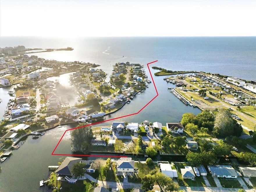 Experience the Gulf Coast boating lifestyle with this Gulf-view, direct-access stilt home offering 2 bedrooms, 2 bathrooms, and 75 feet of waterfront on a saltwater canal with no fixed bridges to the Gulf of Mexico. With easy boating access and spectacular Gulf sunset views, this move-in-ready coastal home is perfect for anglers, boaters, and anyone who loves life on the water.

This elevated home has been well maintained and features numerous upgrades. The seawall with a 4-foot overcap was completed in 2024, providing long-term protection for your waterfront property. The air conditioning system was replaced in 2018, and the seller is offering a $10,000 credit toward a new roof, giving the next owner added flexibility. An instant hot water heater, stainless steel appliances, granite countertops, and a granite kitchen island make the kitchen both stylish and functional. The home also features no carpet throughout for easy coastal maintenance, and all furnishings are included, making this a truly turnkey opportunity.

The luxury spa-style primary bathroom features double vanities, elegant marble flooring, and an oversized walk-in shower, creating a relaxing retreat after a day on the water.

Outdoor living is where this property truly shines. The screened rear porch is the perfect place to relax while enjoying colorful Gulf sunsets and coastal breezes, while the third-story widow’s walk offers panoramic Gulf views that stretch across the horizon. The stilt design also provides ample covered space beneath the home with plenty of clearance to park your boat, RV, or multiple vehicles.

Step outside to 75 feet of concrete seawall with a 4-foot overcap on a saltwater canal that leads directly to the Gulf of Mexico with no fixed bridges. From your backyard dock, it’s an easy 5-minute run to the open Gulf and about a 30-minute boat ride to the famous Anclote Key sandbar, one of the most popular boating destinations on Florida’s west coast. Spend your days fishing for redfish, snook, and snapper, or simply enjoy watching dolphins and manatees swim behind your home.

Located in Hudson Beach, this community is known as a boater’s paradise along Florida’s scenic Gulf Coast just north of Tampa. Life here revolves around the water, where open canals, salty breezes, and breathtaking sunsets create a relaxed coastal lifestyle reminiscent of old Florida fishing villages.

Hudson Beach offers direct Gulf access boating, waterfront tiki bars, local seafood restaurants, marinas, and nightly sunset views that bring the community together. Boaters often pull up to local restaurants or the nearby public beach, creating a vibrant and laid-back waterfront atmosphere.

Conveniently located near US-19, residents have easy access to shopping, grocery stores, restaurants, medical facilities, and everyday conveniences. Tampa International Airport is approximately one hour away, and Orlando’s theme parks are about 90 minutes, making travel and entertainment easily accessible.

Whether you're searching for a full-time waterfront home, a weekend boating retreat, or a coastal investment property, this property offers the true Gulf Coast boating lifestyle—direct Gulf access, world-class fishing, island hopping, and unforgettable sunset views right from your backyard.