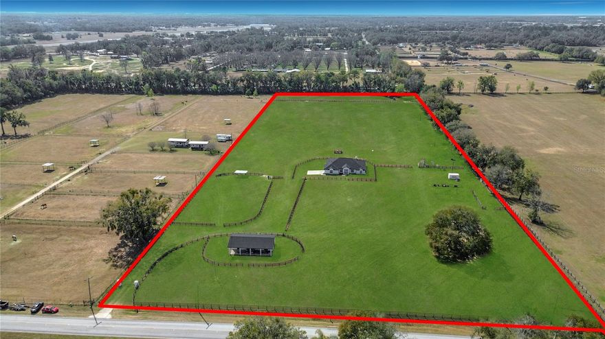 Live the Ocala Equestrian Dream.  Private 14.1-Acre Estate with 3-Stall Block Stud Barn & Updated Home & Barn.  

Experience the freedom of true Ocala Horse Country Living on this beautifully maintained 14.1-acre farm, fully fenced and thoughtfully designed for the equestrian lifestyle. Wake up to sweeping pasture views, enjoy morning rides beneath open skies, and unwind on the covered porch overlooking lush green paddocks.

The light-filled single-story home offers soaring ceilings and inviting living spaces that blend comfort with refined country charm. Large windows frame tranquil farm views, creating a seamless connection between indoor living and the land beyond. Recent upgrades include new roofs and fresh exterior paint on both the home and the barn, providing move-in-ready confidence and long-term peace of mind.

Equestrians will appreciate the 3-stall block stud barn, quality board fencing, and fully cross-fenced acreage offering secure turnout and flexibility for expansion. Whether you're breeding, boarding, or simply enjoying the equestrian lifestyle, this property delivers space, privacy, and functionality in one of the most sought-after horse communities in the country.

Located in the heart of Ocala — the Horse Capital of the World — just minutes from world-class equestrian venues, shopping, and dining, this is more than a property… it’s a Lifestyle.

The beautiful home is an open 3BR/2BA floorplan with large den/office as well.  It also boasts an oversized garage and back porch too.  The gas fireplace adds ambiance to the large living room.  It is situated in a Farmland Preservation Area so development nearby is extremely limited.  Brand New Roofs, New AC in 2023, 2 Wells and 2 Septic Systems on the property.

Seller is offering $25K credit towards interior upgrades on appliances, flooring or counter tops, etc.  Your Choice!

Selling Property "AS-IS"

All information in this listing is deemed and intended to be accurate but should be independently verified by buyer and their agent.

*Some photos have been enhanced to create greener grass to simulate Summer grass and cleaner lines and surfaces*