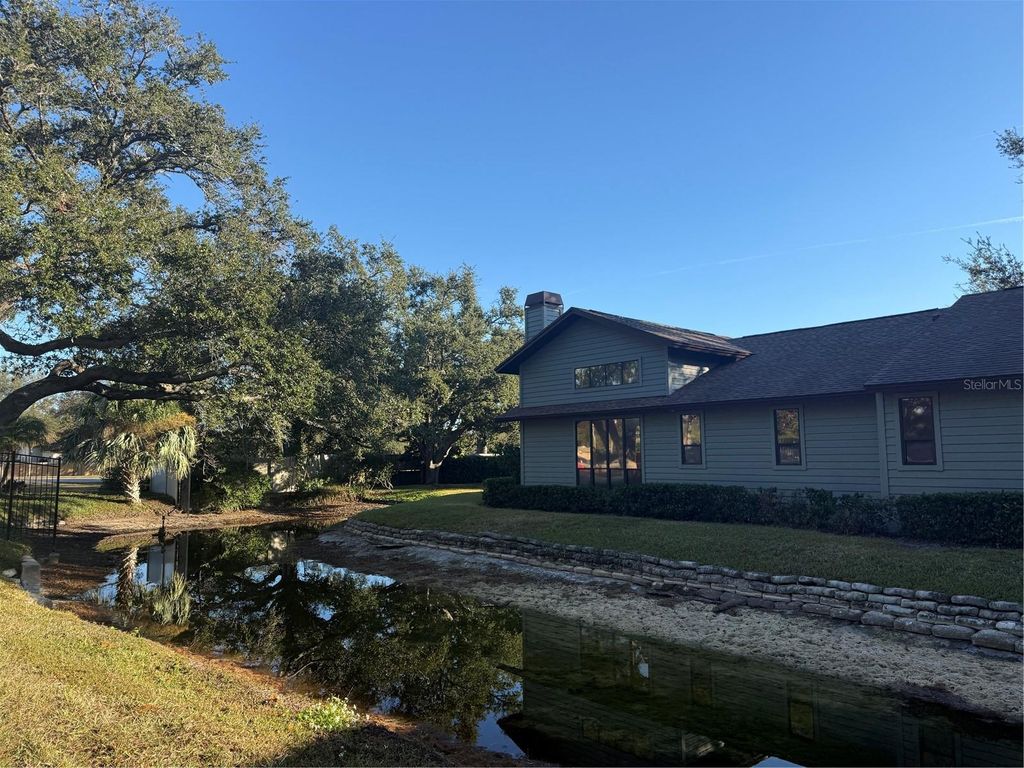 Photo of 11711 Ridgeview Lane, Seminole, FL 33772 (MLS # TB8454378)