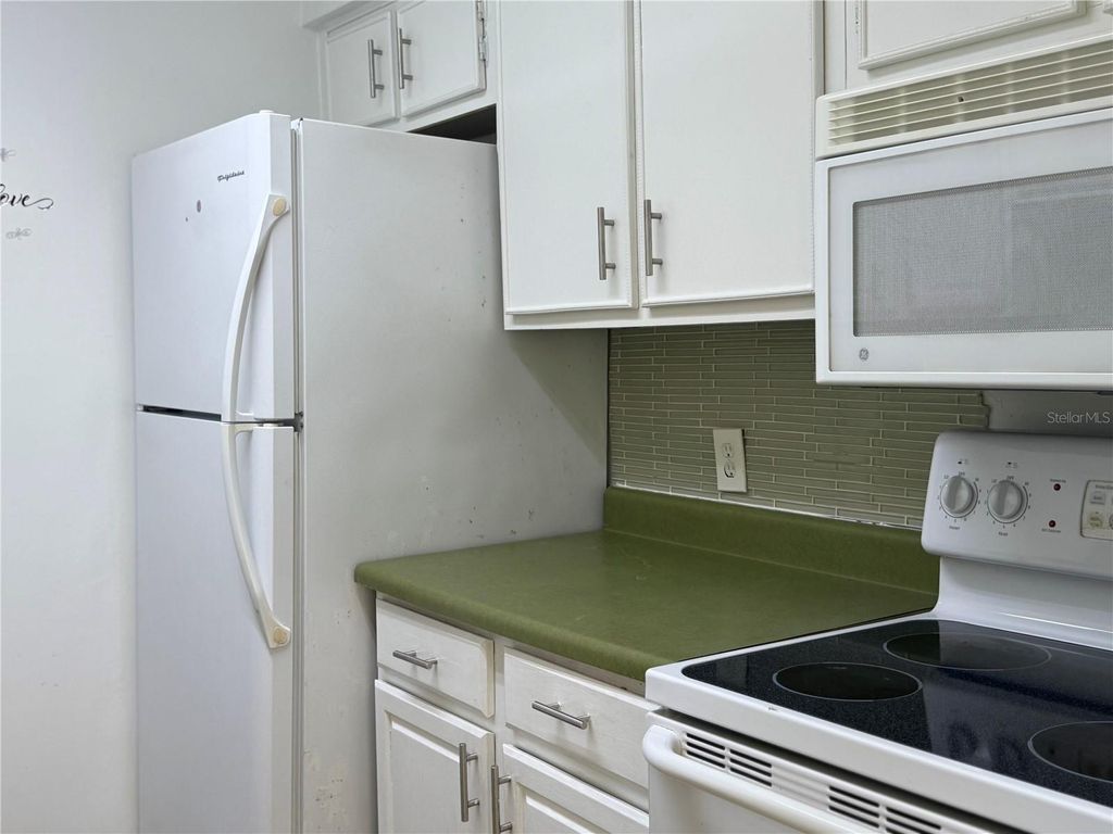 Photo of 9109 W Hillsborough Avenue #J207, Tampa, FL 33615 (MLS # TB8447137)