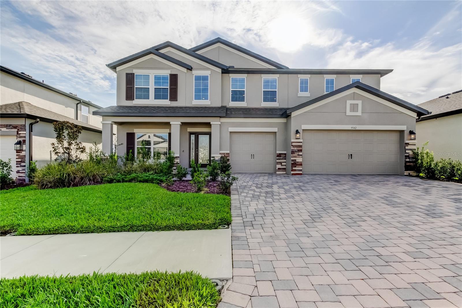 Welcome to your new home in the heart of Wesley Chapel! This spacious and modern single-family residence offers nearly 3,300 sq. ft. of living space with 5 bedrooms, 3 bathrooms, a loft and an open floor plan perfect for both comfort and entertaining. Built in 2024, the home features high ceilings, a gourmet kitchen with stainless steel appliances, quartz countertops, and a large island overlooking the bright family room.
The upstairs retreat includes a generous primary suite with a spa-like bathroom, walk-in closet, and additional flexible living areas. Enjoy a private backyard for relaxing evenings, outdoor kitchen for weekend barbecues. A 3-car garage and energy-efficient construction complete this beautiful home. Located in the desirable Epperson Lagoon community, you’ll have access to incredible amenities including the crystal-clear lagoon, trails, dog parks, playgrounds, and clubhouse. Convenience at your doorstep: just minutes from The Shops at Wiregrass, Tampa Premium Outlets, AdventHealth Wesley Chapel, and major highways for an easy commute to downtown Tampa. Top-rated schools nearby include Watergrass Elementary, Thomas E. Weightman Middle, and Wesley Chapel High, making this home an excellent choice for families.