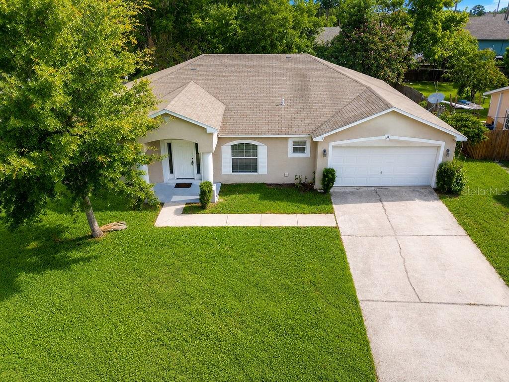 Photo of 35 Belleaire Drive, Palm Coast, FL 32137 (MLS # FC319939)