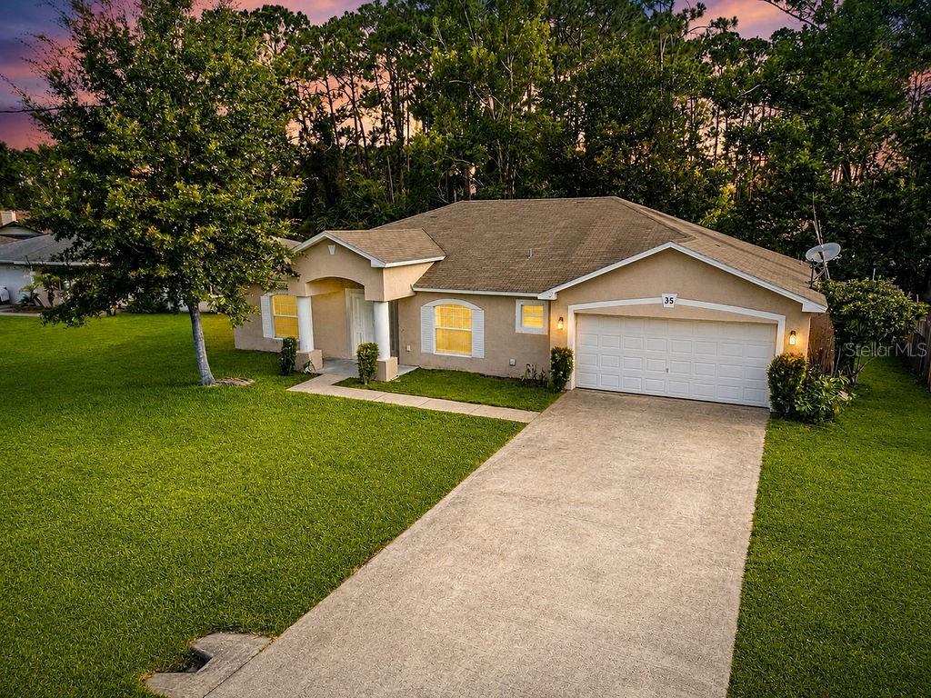 Photo of 35 Belleaire Drive, Palm Coast, FL 32137 (MLS # FC319939)