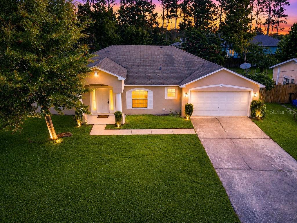 Photo of 35 Belleaire Drive, Palm Coast, FL 32137 (MLS # FC319939)