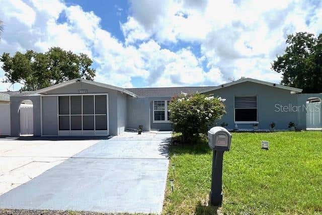 Photo of 9104 Crabtree Lane, Port Richey, FL 34668 (MLS # TB8538840)