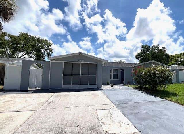 Photo of 9104 Crabtree Lane, Port Richey, FL 34668 (MLS # TB8538840)