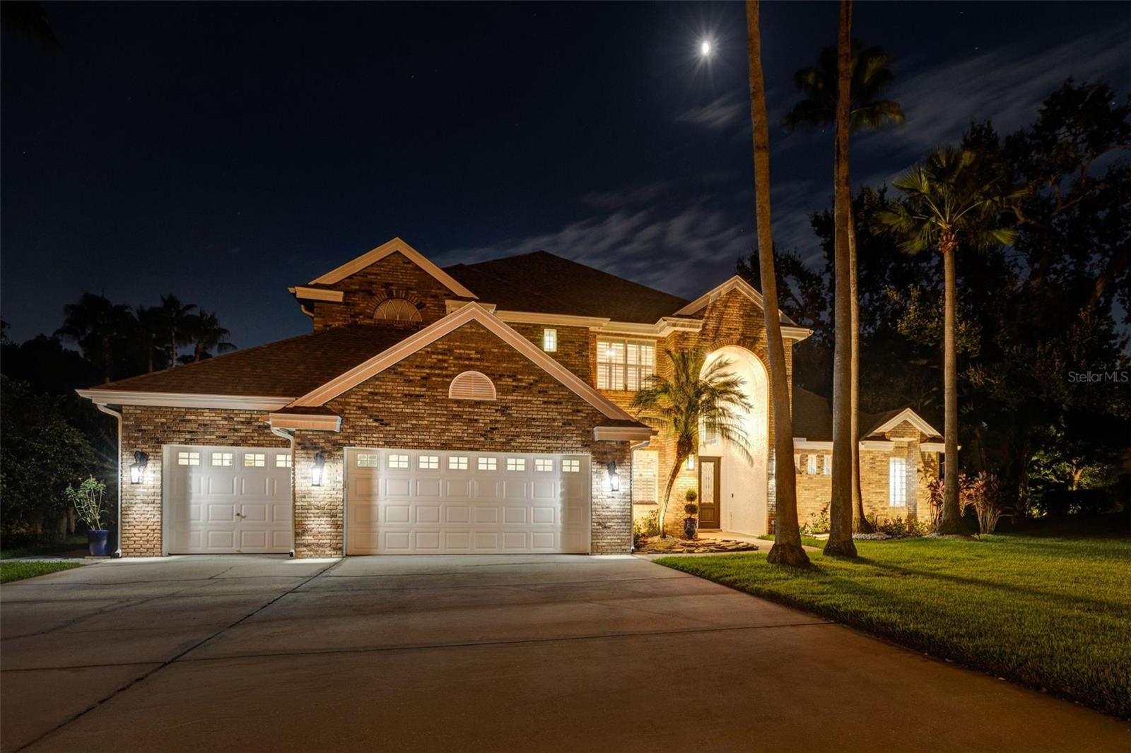 Welcome to your dream home! Enter through the security gate into this stylish community of 39 prestigious homesites located minutes to highly sought after downtown Safety Harbor! Step into timeless luxury with this stunning two-story traditional brick home where classic charm, and traditional craftsmanship meet modern sophistication. From the moment you arrive, you'll be captivated by the homes grand exterior, and thoughtful design. A new dimensional shingle roof was added May 2025, along with replacement of soffit, fascia and gutters. Also the saltwater pool/spa received new equipment, Hayward filter, propane gas heater for the spa and electric heater for the pool, along with a new birdcage and screening. Three-zone HVAC system independently controlled, 2016, 2016, and 2019. The 2019 Rheem light duty commercial hot water heater holds a whopping 85 gallons, Nuvis water conditioning system. Epoxy flooring in the 3 car garage, April 2020. You'll be greeted by exquisite double front doors (2021) that make a grand first impression, setting the style that continues throughout the home. This 5 bedroom PLUS an office, 3 full baths PLUS 2 half baths (one of which is a pool bath) sits on a generous .40 landscaped lot with five towering Sabal palms providing timeless beauty. Spacious 3,593 heated sq. ft. of luxurious living and 4640 sq. ft under roof. Inside discover beautiful Armstrong Artesian Hand-Tooled Hardwood Flooring rich in texture and found in every room excluding the laundry. The show stopping gourmet kitchen is designed to impress with a GE Monogram 48-inch dual fuel professional gas range with six burners, grill and griddle, (check out the range hood) also a sleek SUB-ZERO 42" built-in French door refrigerator/freezer with internal dispenser. Additional premium appliances include a GE Monogram drawer microwave and a GE Monogram dishwasher. This home also features a SUB-ZERO wine storage designed to preserve your collection. Thoughtfully designed for the discerning collector, it is Star-K certified to meet strict religious regulations. This kitchen with its elegant cabinetry, corbels and granite counter-top finishing is perfect for elegant entertaining or preparing simple meals, gathering around the breakfast bar or breakfast nook. Now enter through century old wooden doors with a history of New Orleans into the expansive primary suite with a diverse flex space, featuring 2 spacious walk in closets, one more spacious than the other. Next prepare to step into a lavish en suite where marble throughout creates a spa-like atmosphere. Indulge in the oversize shower featuring 5 invigorating shower heads or unwind in a separate soaking tub beneath a statement chandelier, your ultimate retreat. A private water closet adds both convenience and discretion. Across the home is a private office with a set of glass French doors suited for work or study. Built-in cabinetry offers both function and style. Upstairs you'll find four generously sized bedrooms each offers comfort, light, and ample closet space. Two well-appointed full baths service this level. This truly is a ONE-OF-A-KIND home! Words and photos simply can't capture the full experience. Thank you for showing!