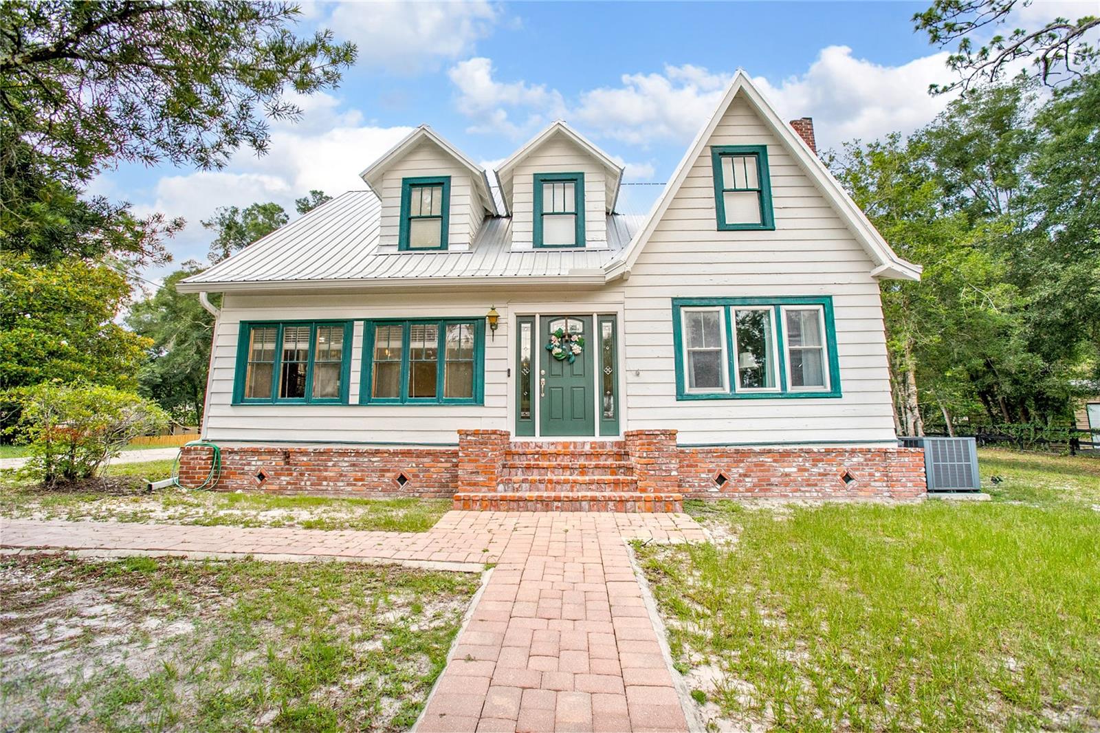 Don't Miss this Charming 1924 Historic Home in the Heart of DeLand! MAIN HOUSE 5BR/2.5 BATH - IN LAW SUITE 1/1
Step into the past while enjoying all the comforts of today in this beautifully preserved historic home, located at 257 Huntington Drive, DeLand. This home is Situated on a double LOT and a tree-lined street just minutes from shopping, restaurants, and activities. The possibilities are endless with a double lot and In-Law suite.
This TWO story residence features hardwood floors, high ceilings, a cozy fireplace and vintage built-ins. One of the home’s most remarkable features is its exterior brickwork, which was carefully relocated from DeLand’s first Christian church built in 1894, adding a rare and meaningful piece of local history to this unique property.
The flexible layout includes FIVE generously sized bedrooms and two and half baths in the main house and is ideal for family living or entertaining guests. The guest house or In-Law Suite needs your TLC and imagination but is a 1-Bedroom unit with a Bathroom and carport. In-law suite, WORK SHOP, or storage area, your choice! This home even has a basement. This distinctive property offers timeless character, architectural beauty, and a truly one-of-a-kind story, The serene backyard offers space to garden, entertain, or simply relax.
Don’t miss your opportunity to own a piece of DeLand’s legacy—homes with this much history and character rarely come to market!
Seven minutes to interstate four, thirty minutes to the sandy beaches and one hour to the theme parks.
HOME FEATURES: Carport 1985, Gutters 2022, Metal Roof 2014, Hot Water Tank 2022, Upper A/C unit 2015 ,Lower A/C Unit 2019, Drain Field and Septic Tank replaced 2020,